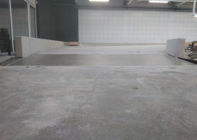 Betonvloer en tegelwerk